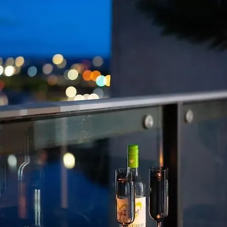Riverside Penthouse With Bar
