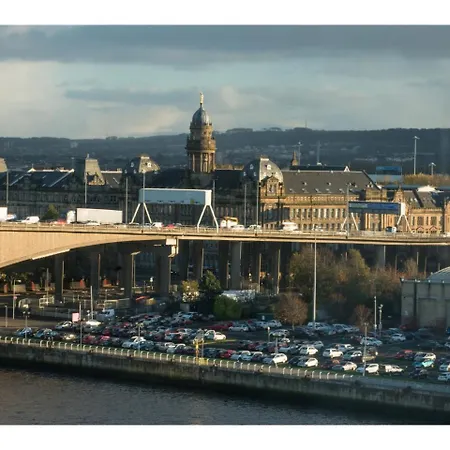 Riverside Simplicity: Great Views Secure Parking Apartment Glasgow
