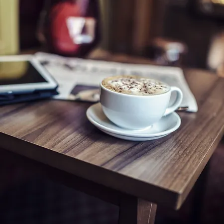 Отель Carlton George 4*