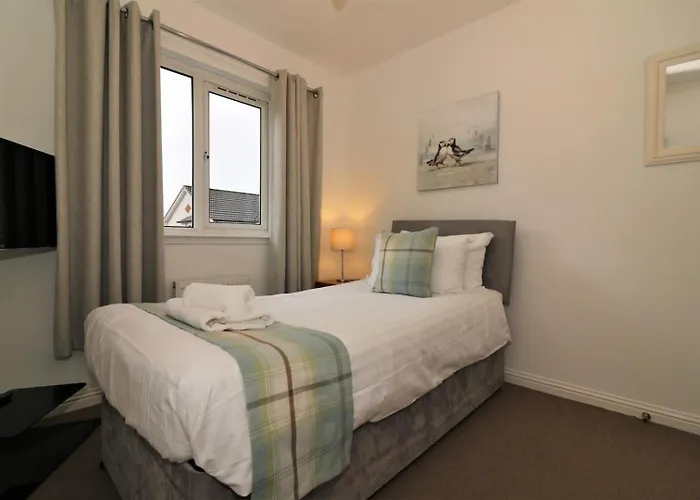 Signature - Angus House Appartement